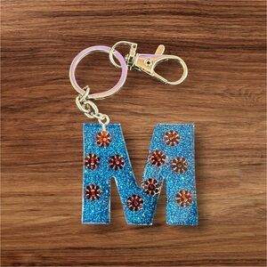 ♨️flash sale💯Glitter Blue 'M' Keychain with cute flowers 🌺